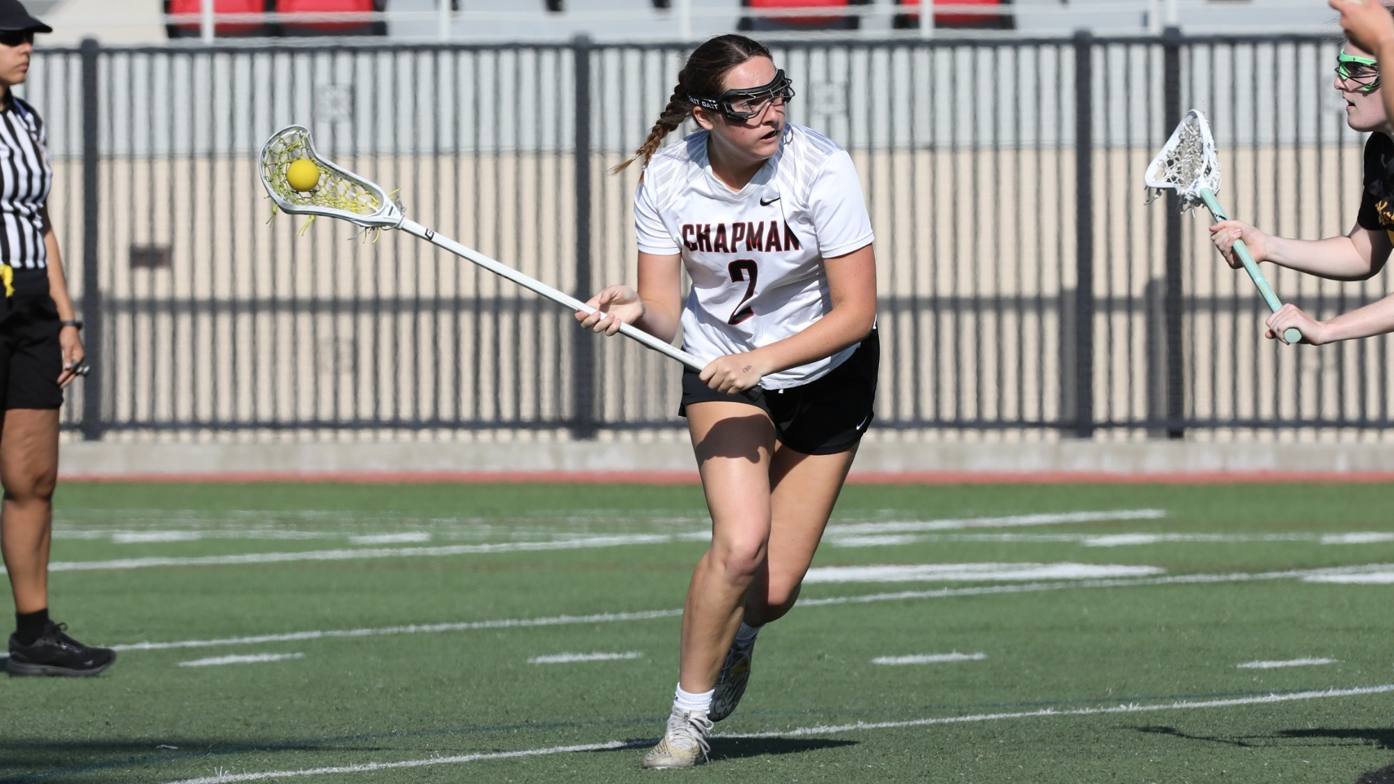 Madi Escobar shooting the lacrosse ball.