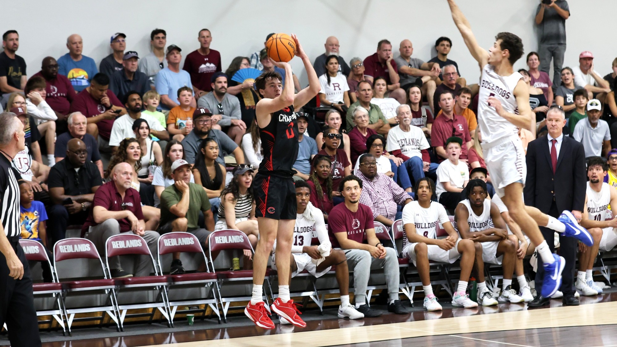 Jake Heberle shoots a three-pointer.