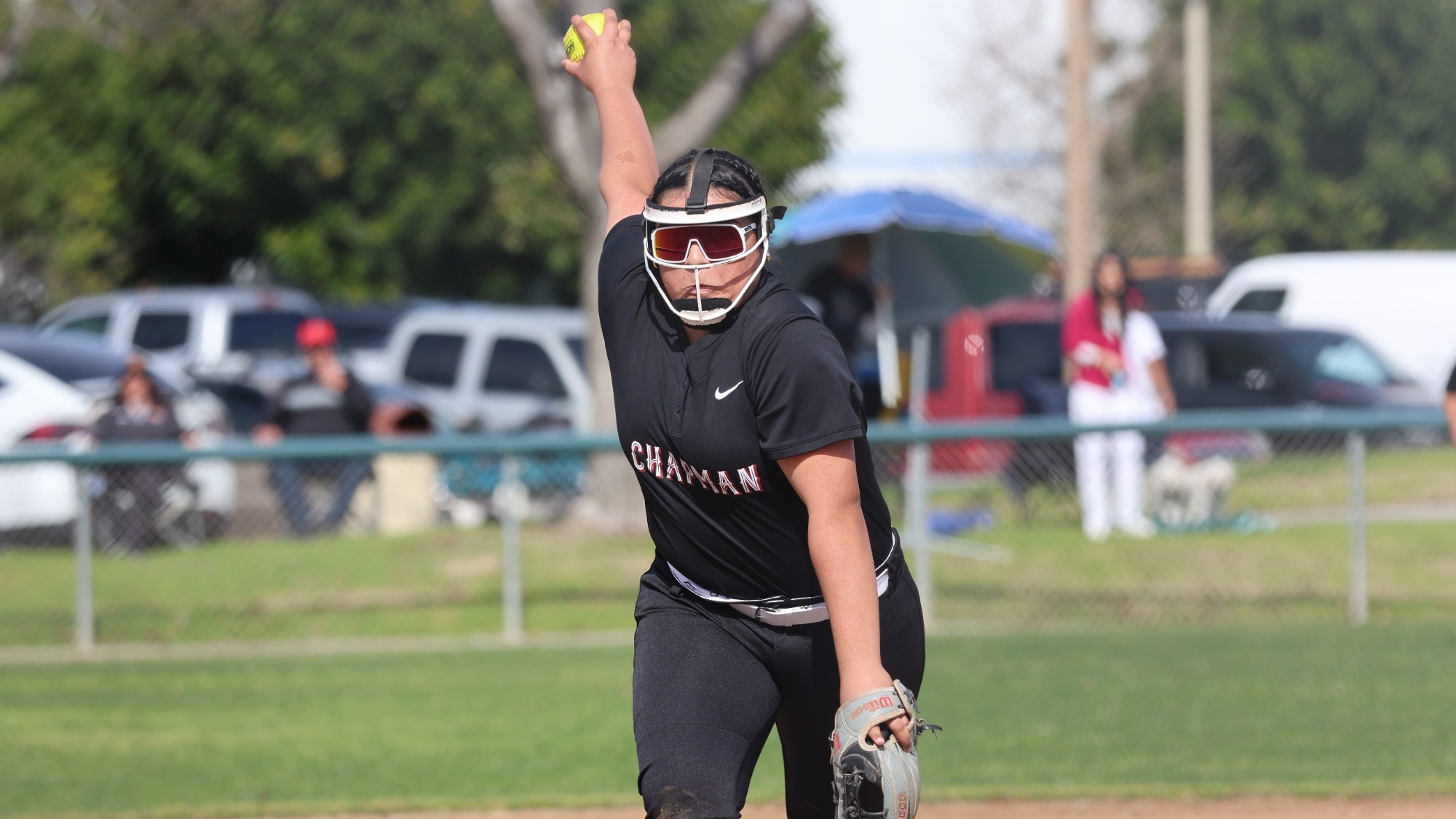 Anabell Hinojosa throws a pitch on the softball field.