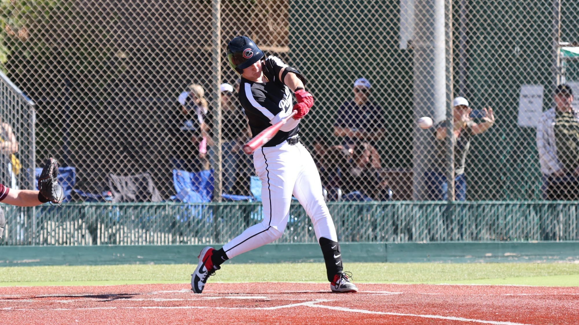 Nick Molina swings at a pitch.