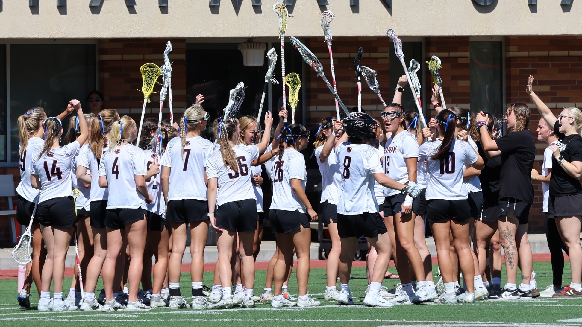Women's lacrosse team huddle