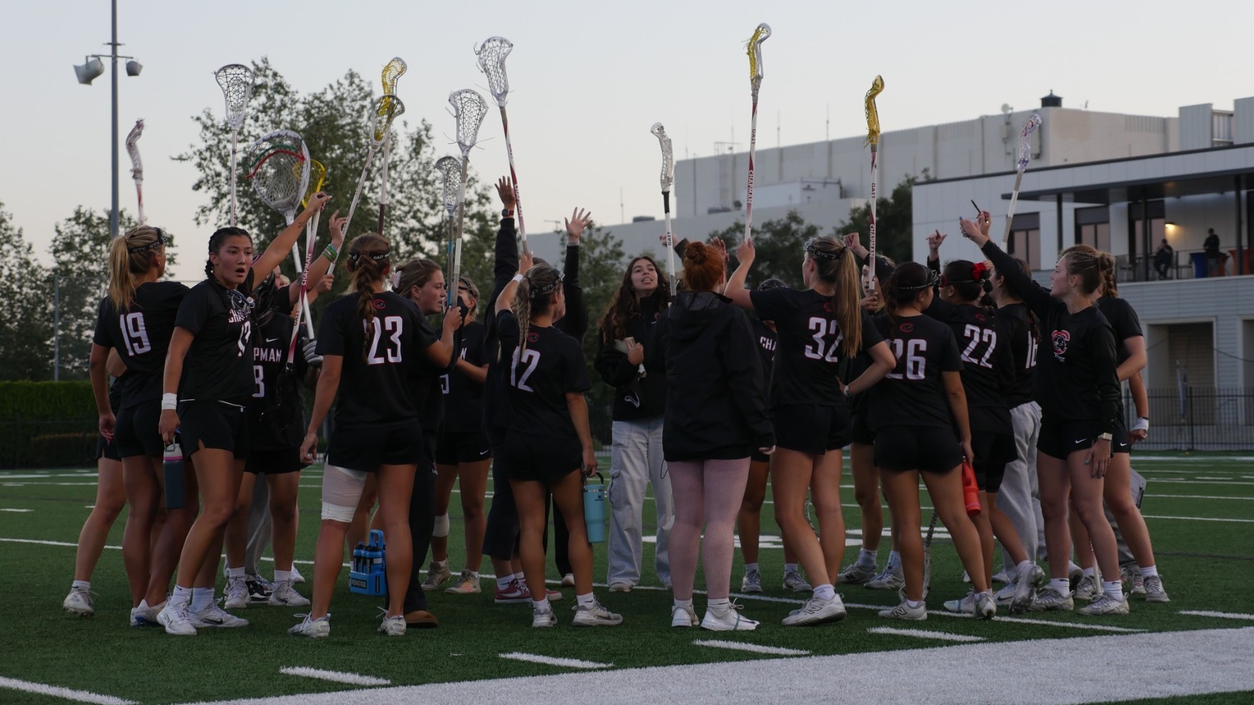 Women's lacrosse team huddle