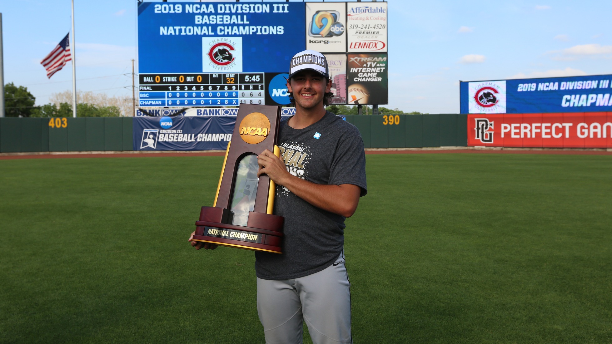 Nick Garcia holding the national championship trophy.