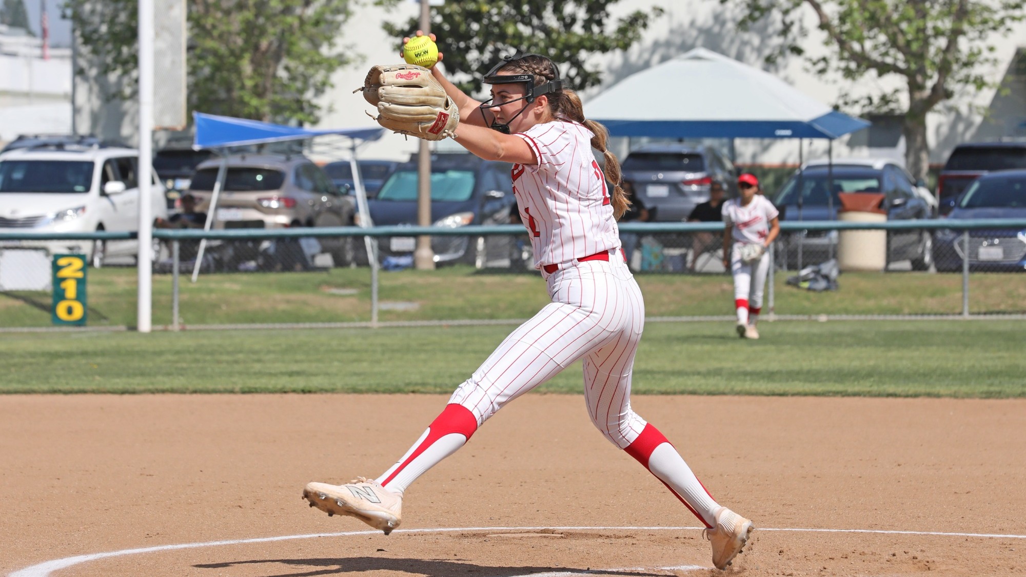 Rose Malen pitching on the softball field.