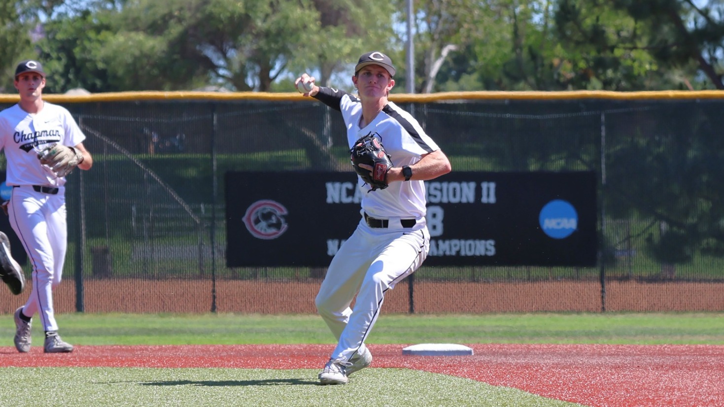Ryan Nopper throws the ball to first base.