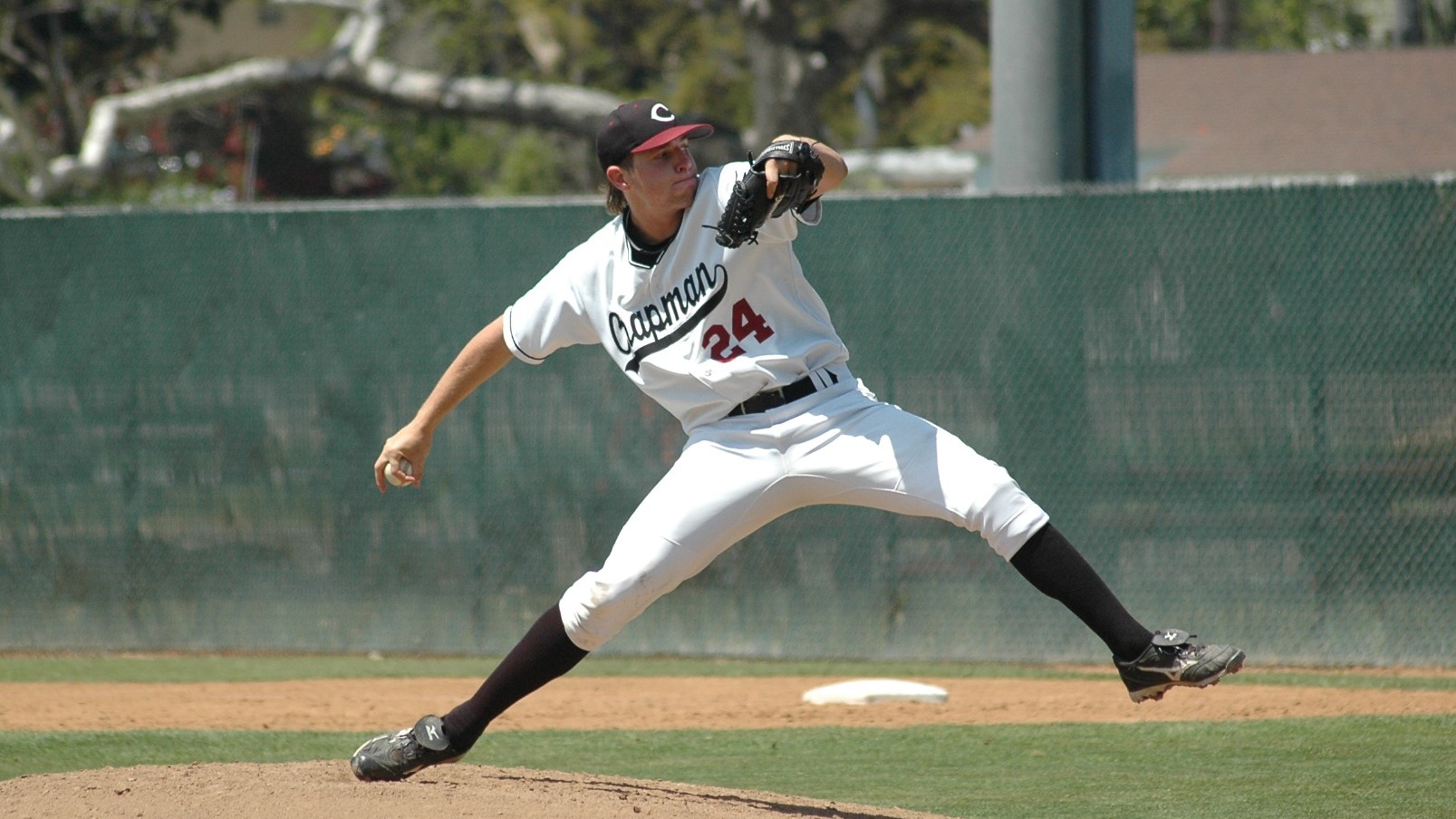 Brian Rauh throws a pitch on the baseball field.