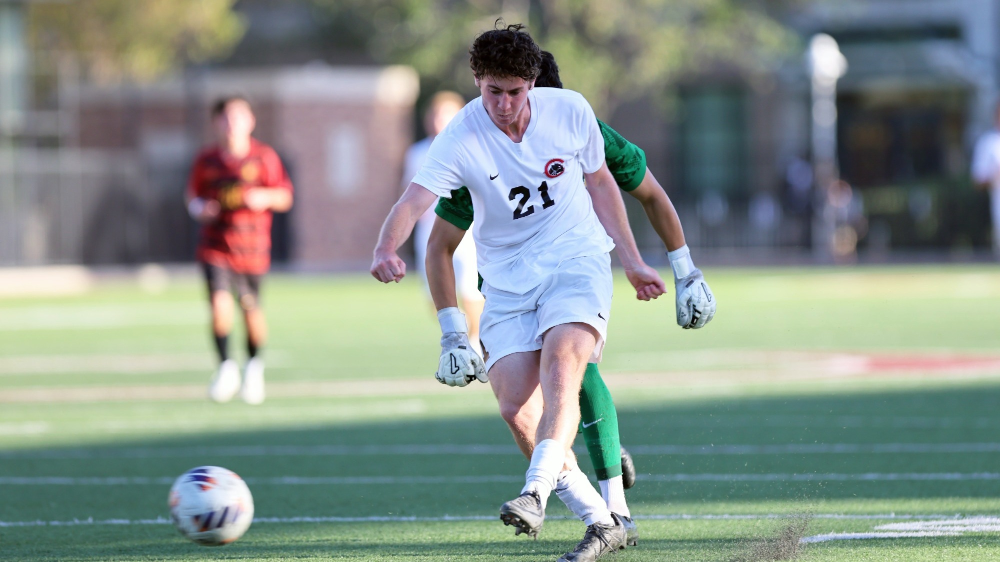 Hudson Weinberger takes a shot on the soccer field.