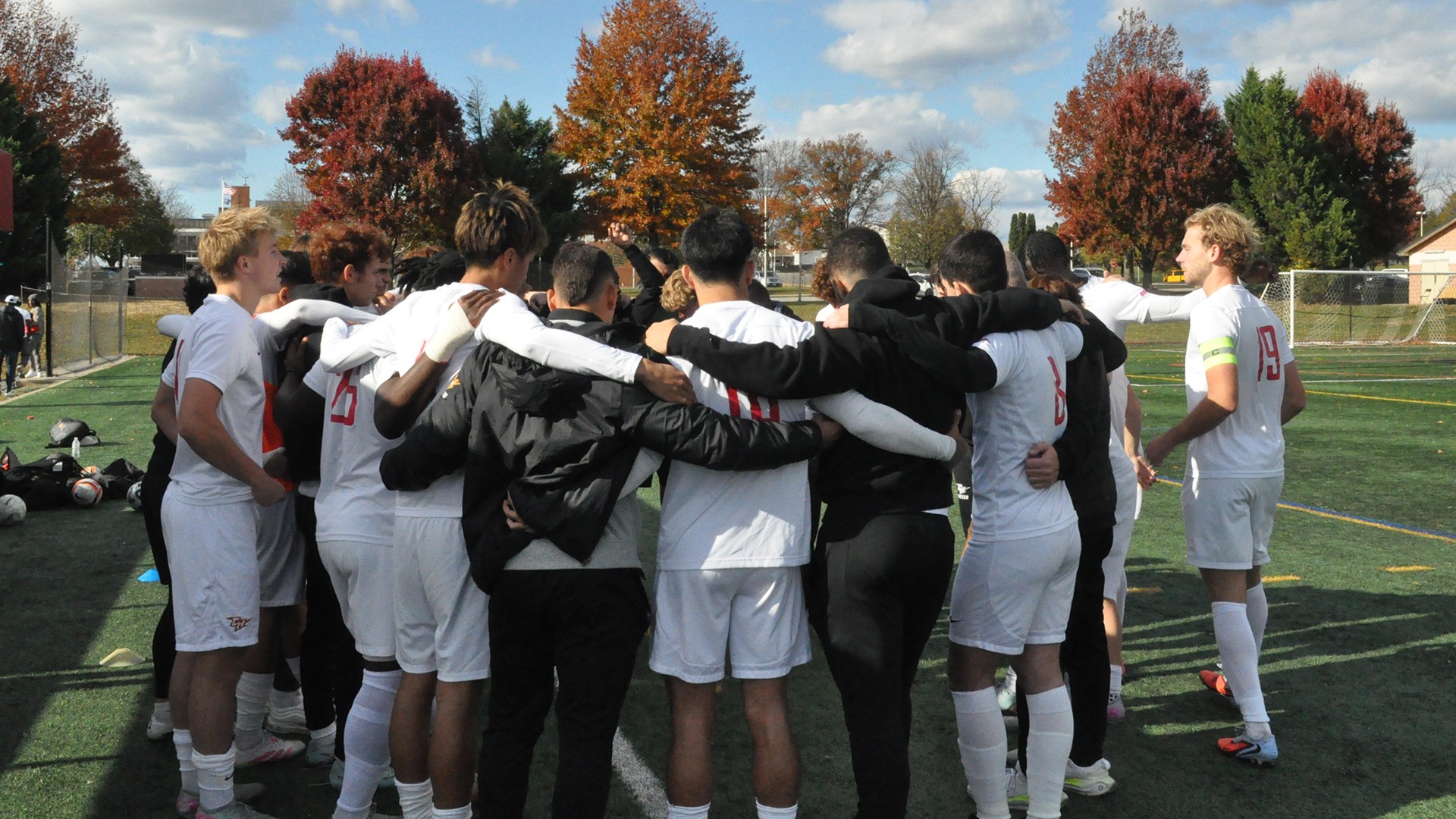 huddle on senior day