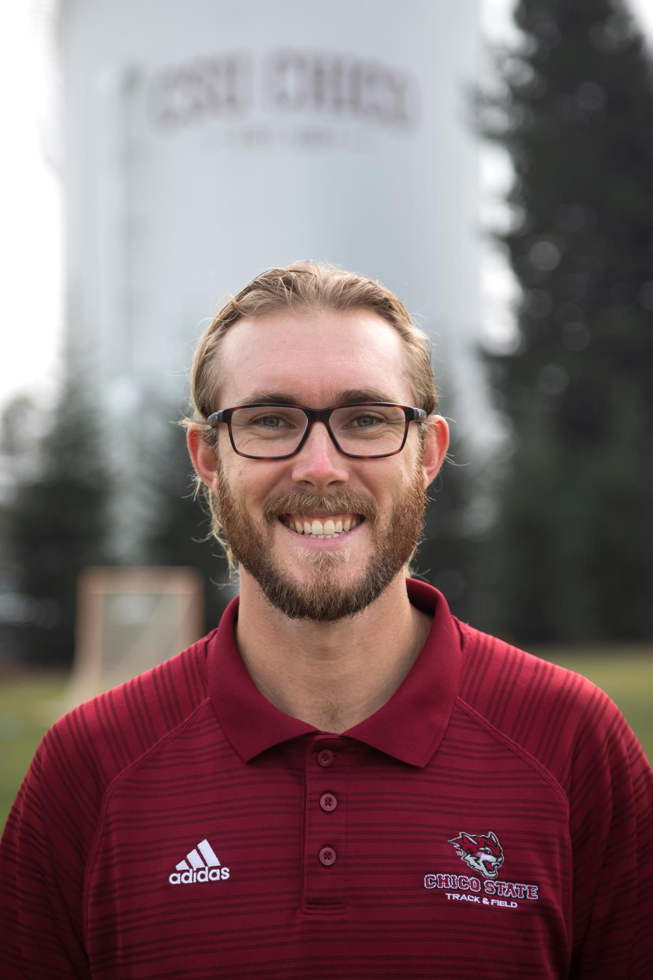 Track and field assistant coach John Brunk