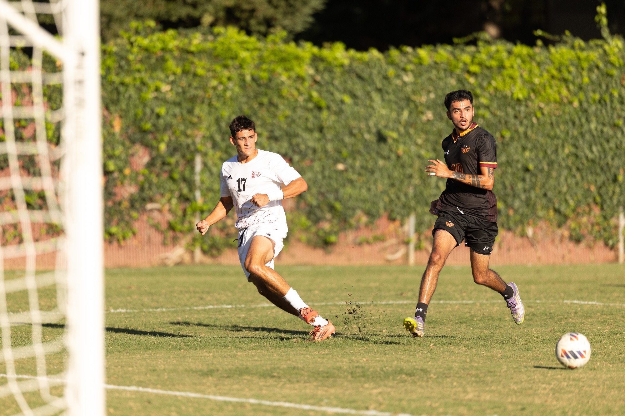 Darius Dukes Passing a cross to the middle of the box against the Toros