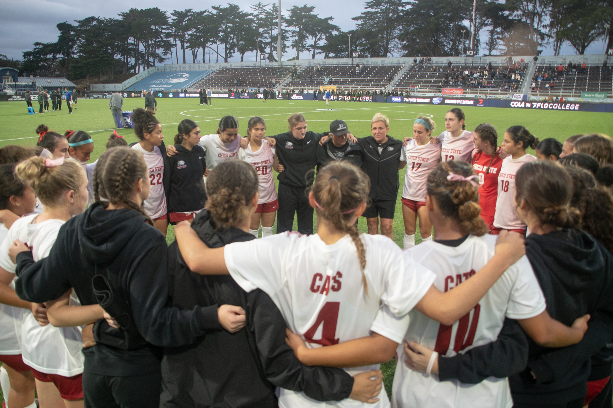 Chico State women's soccer huddles after loss in CCAA Tournament Final