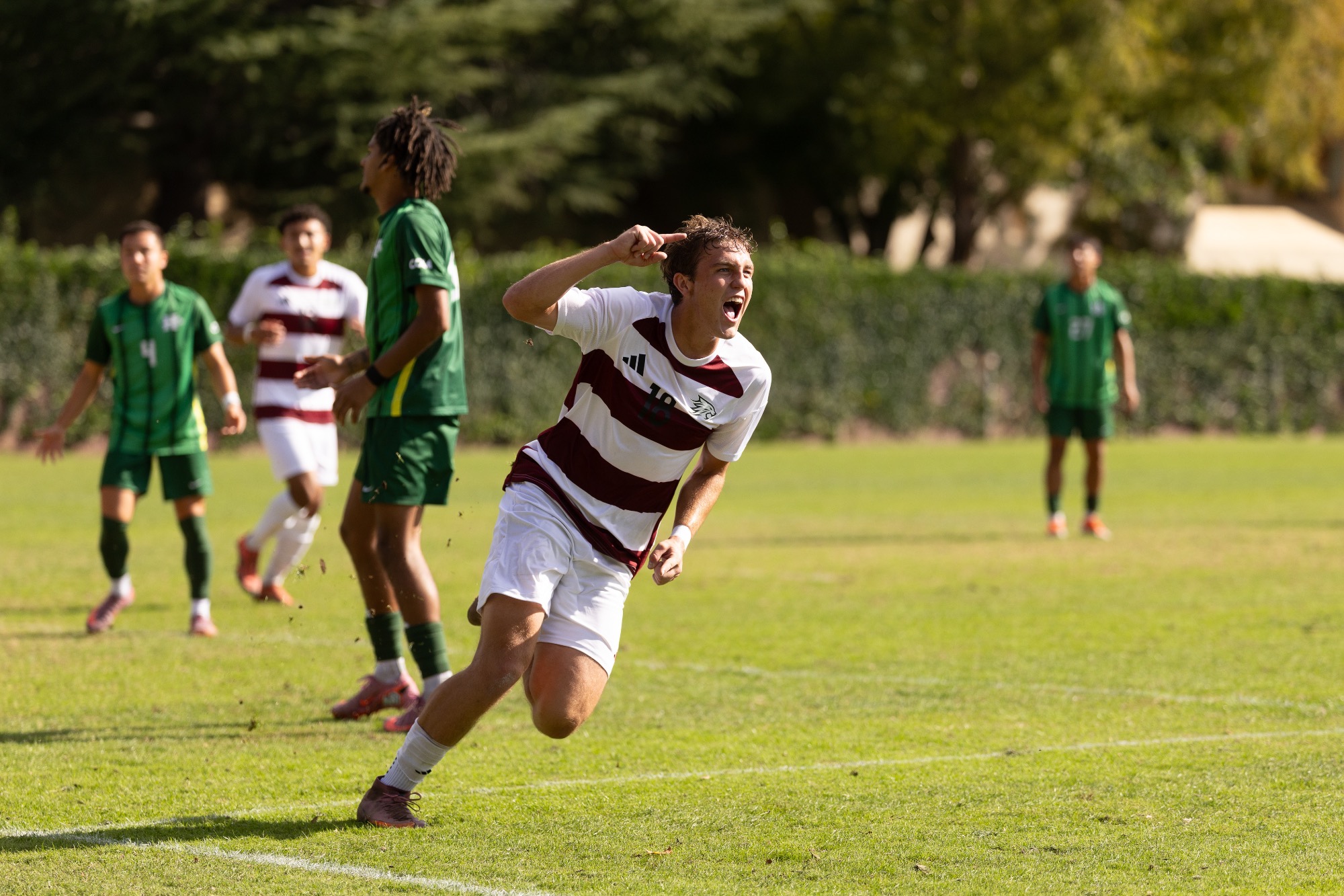 Dane Peterson celebrating after scoring against CPH