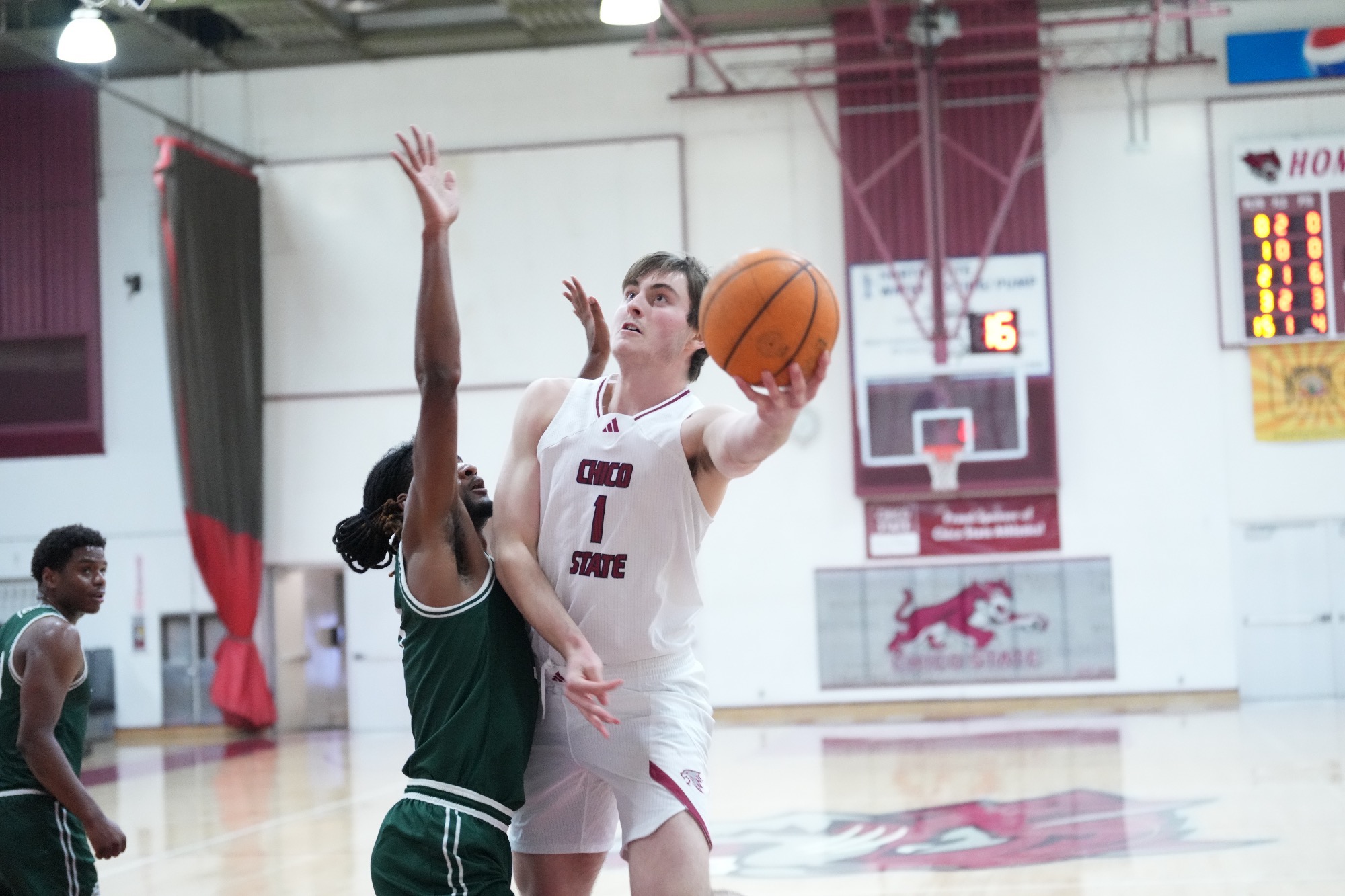 Xan Meyer-Plettner going up for a layup against Pacific Union defender