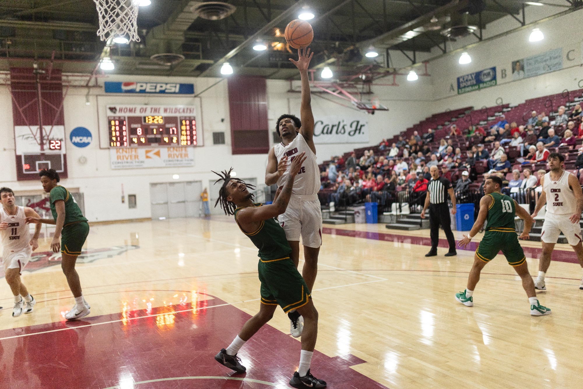 Robel Zemmo shooting a floater over a CPH player
