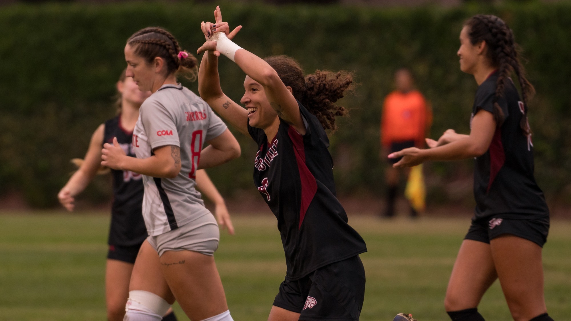 Chico State Wildcats’ #9 Gabrielle Starr (center) reacts to scoring against Stanislaus State Warriors in the second half of their Women's Soccer (WSOC) game on Thursday, October 22, 2026 in Chico, Calif.(Jason Halley/University Photographer/Chico State)