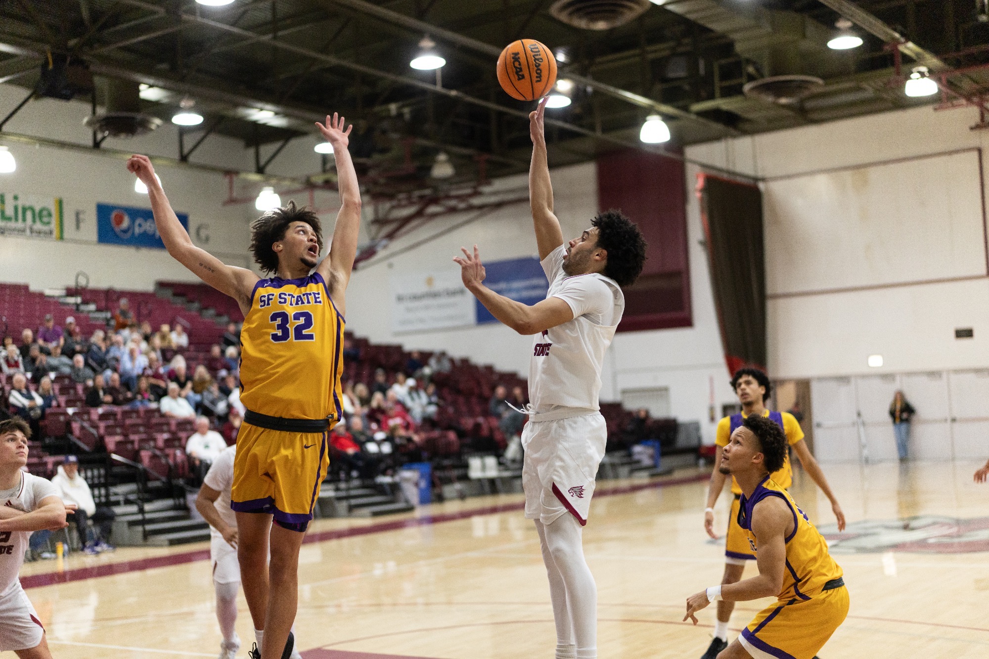 Chris Holley floating the ball over Gator player