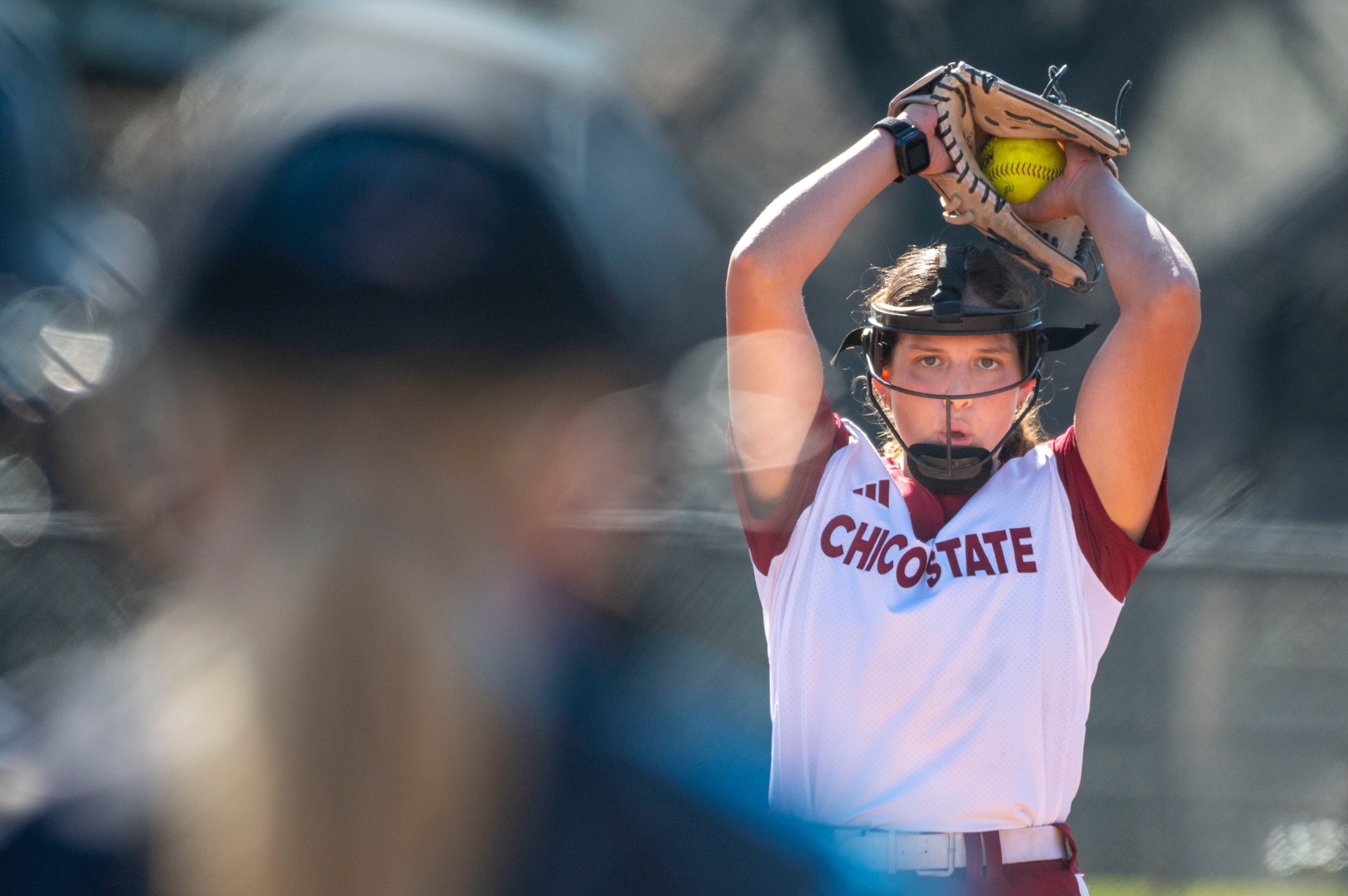 Bella Tavares winding up to pitch to a Jessup batter in home opener 2026