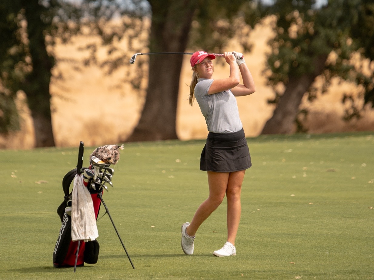 Hollyn Drennen holding her swing after a shot