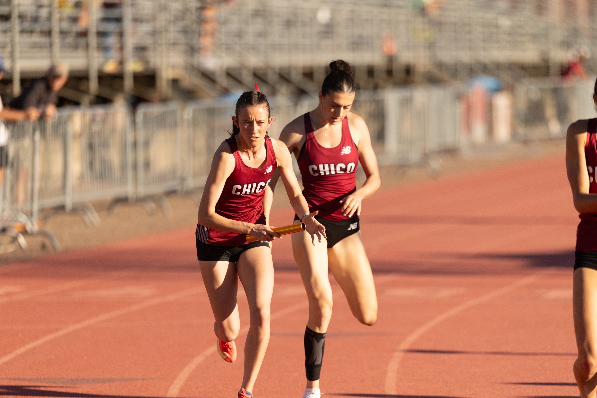 4x100 Relay hand-off at Wildcat Invite