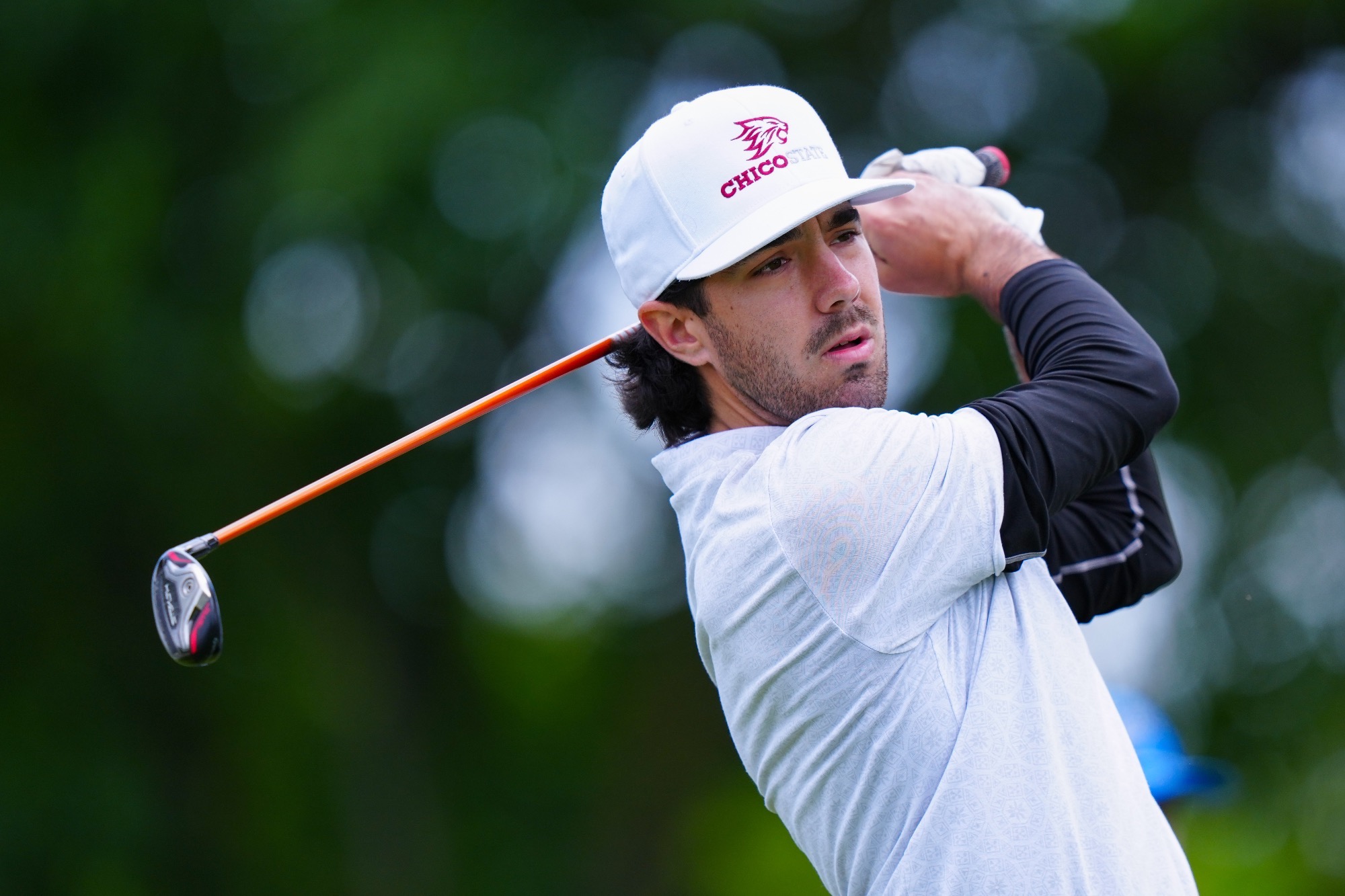 Guiseppe Aliotti holding his follow through after a drive on hole one at the 2026 CCAA Tournament