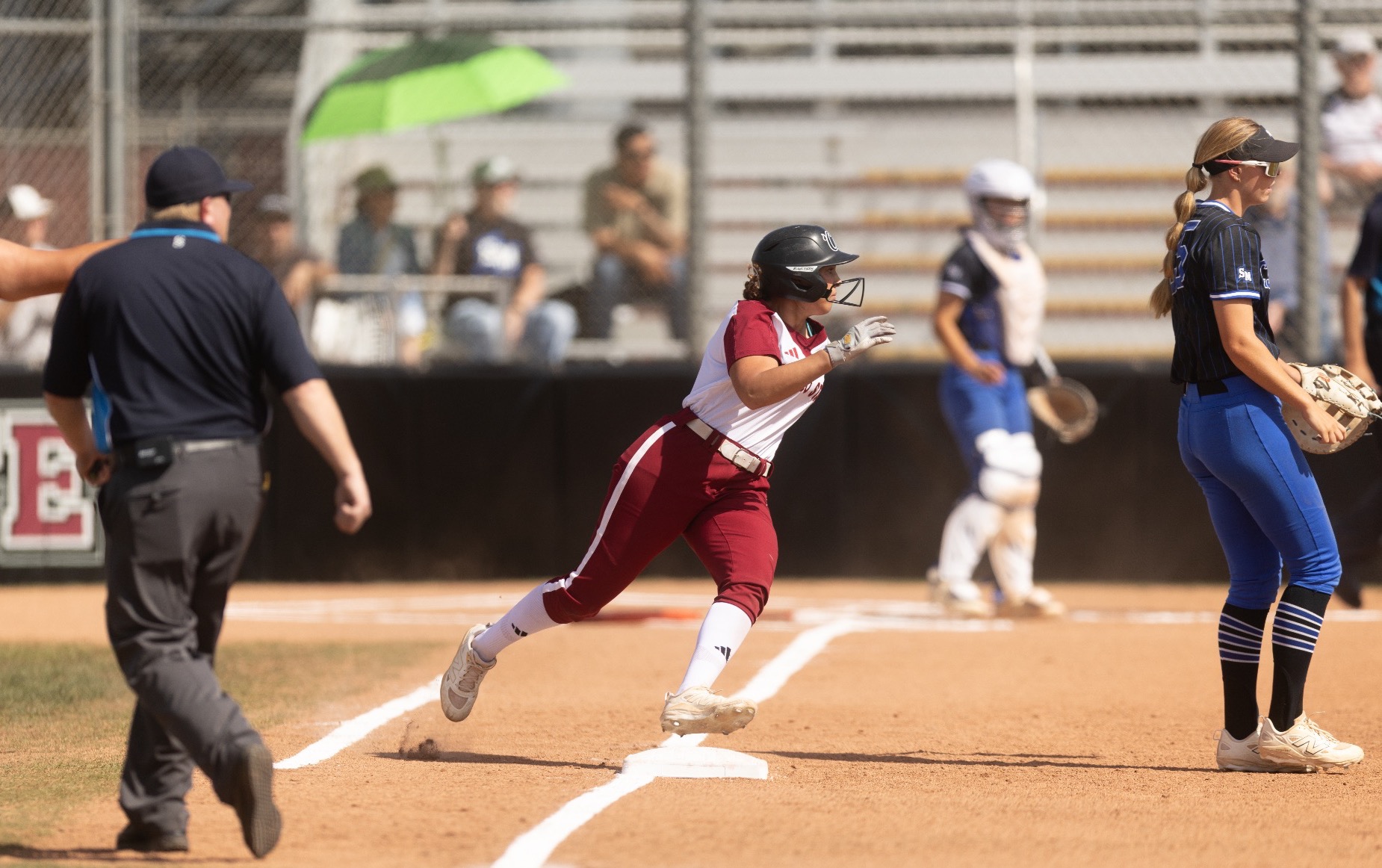 Aiyana Curry running through first base hoping for a second against San Marcos