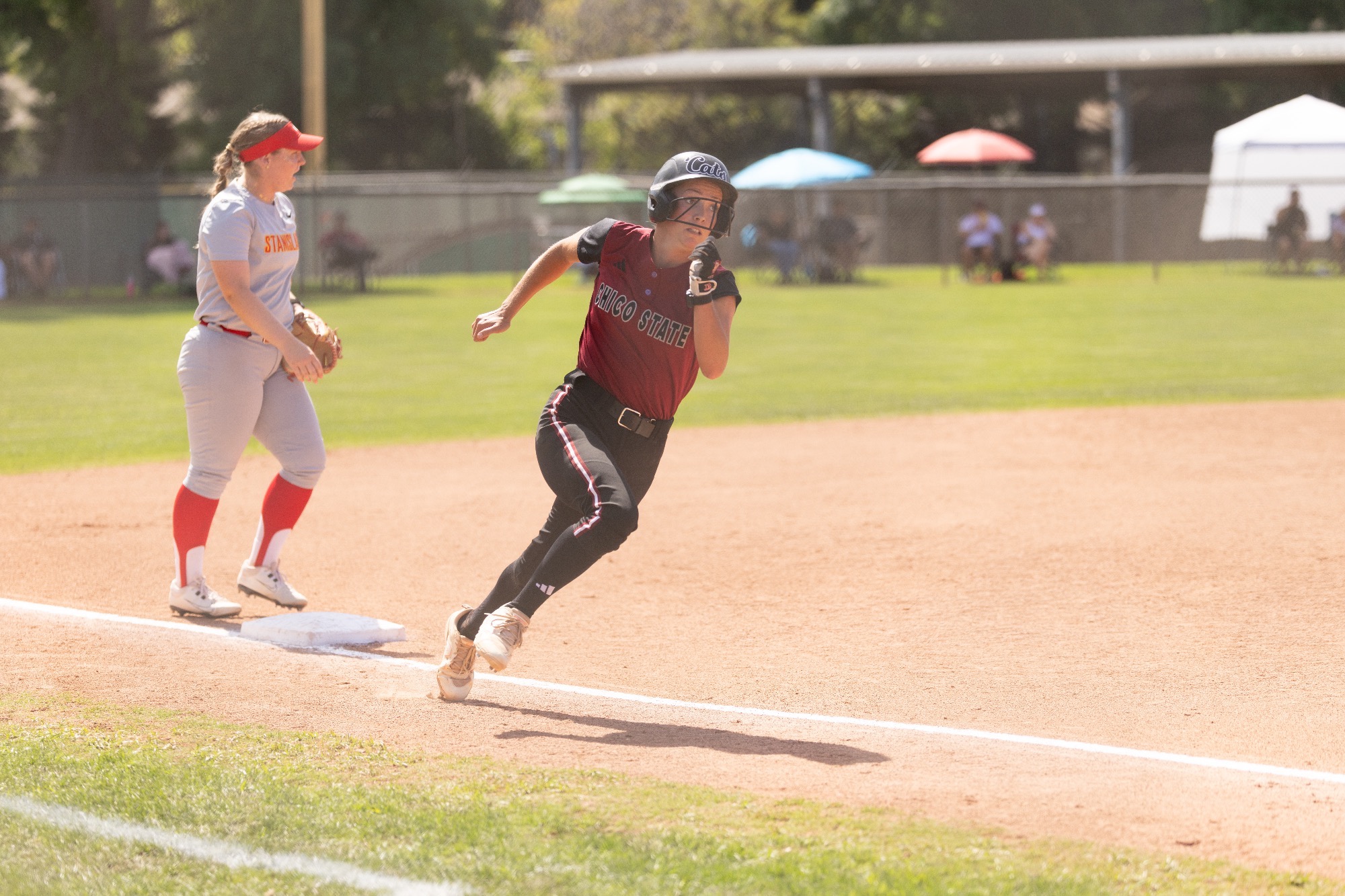 Bri Swihart running past third base 2026