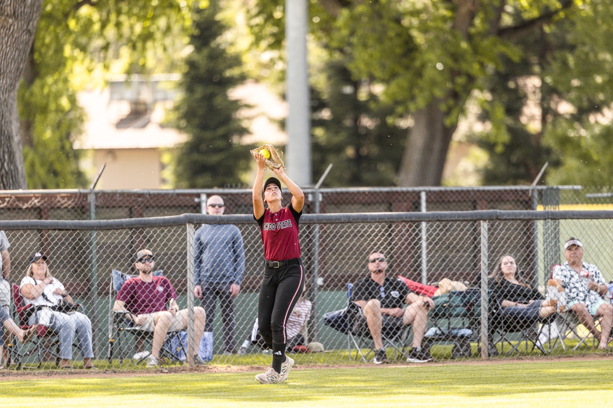 Hannah Levy catching ball in the left field