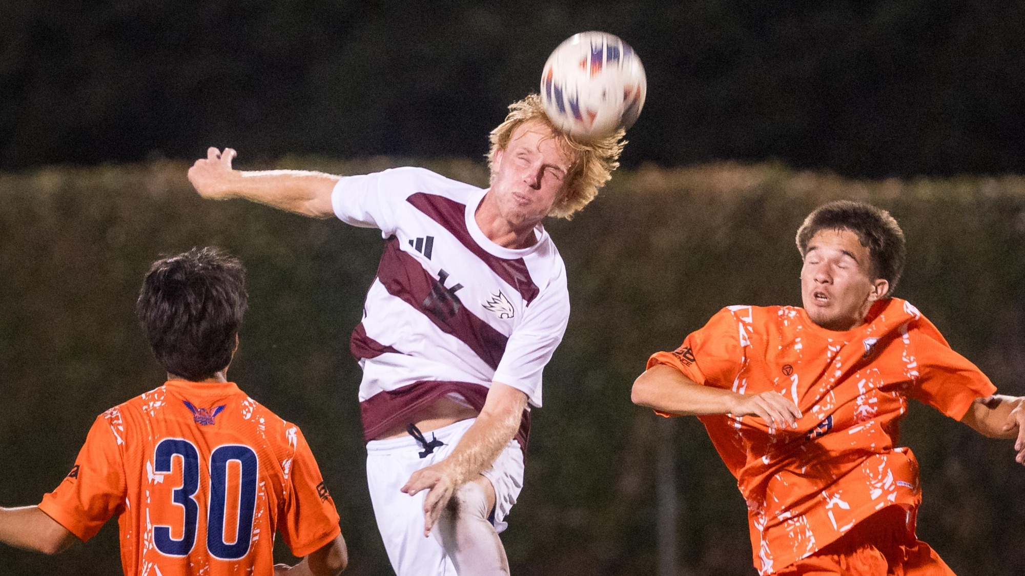 Chico State Wildcats’ #16 Cooper Gyll (center) against Cosumnes River College Hawks in the second half of their Men's Soccer (MSOC) scrimmage game on Wednesday, August 19, 2026 in Chico, Calif.(Jason Halley/University Photographer/Chico State)