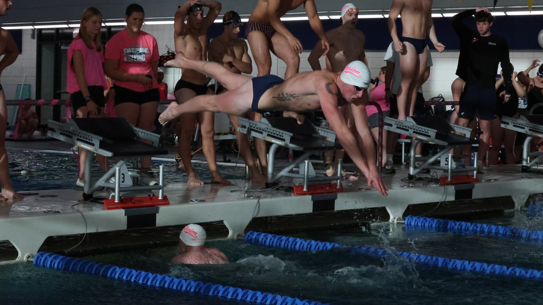 bittner diving in during medley relay