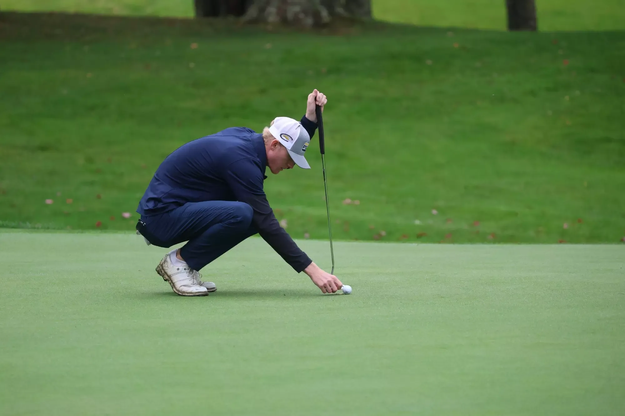 Men's Golf Grove City Invitational Kameron Kerle Surveying His Ball On The Green
