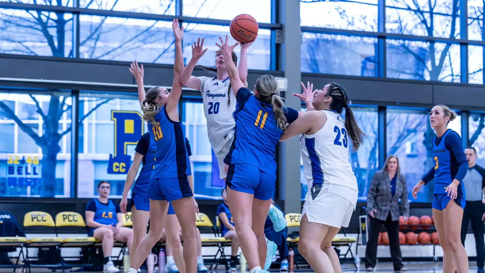 Emily Peabody drives for a layup vs Linn benton