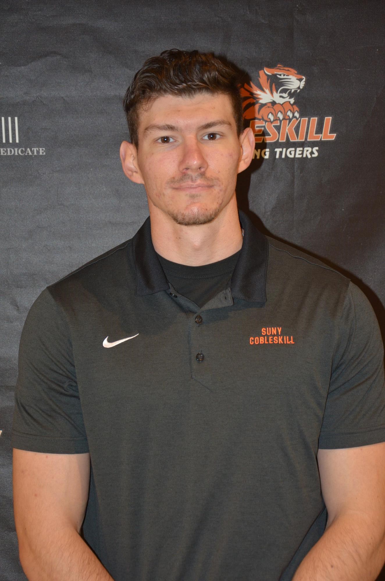 Head Track & Field Coach Zach Hasking II