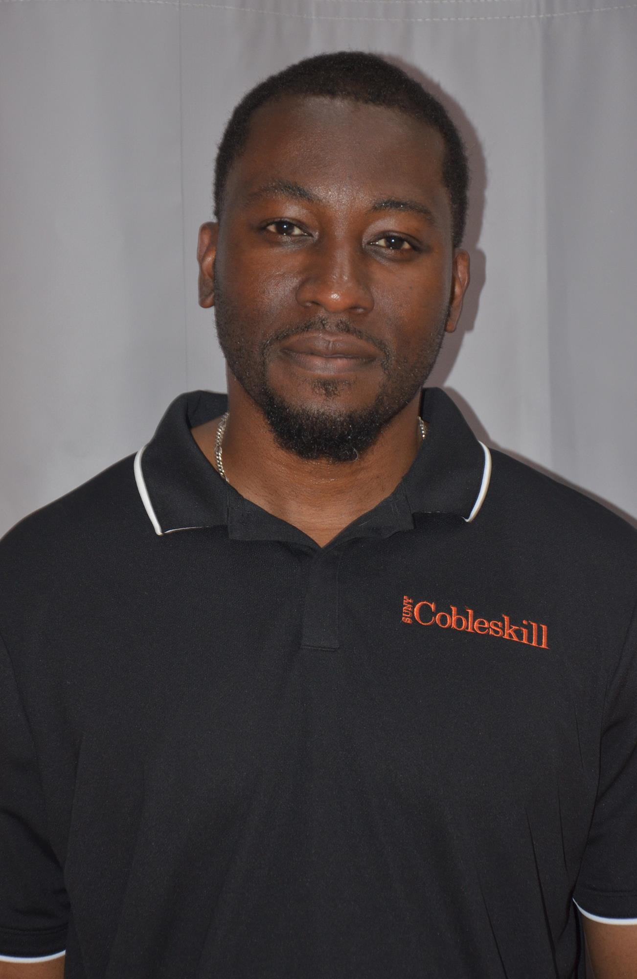 Head Women's Soccer Coach Chuckwuma Asala
