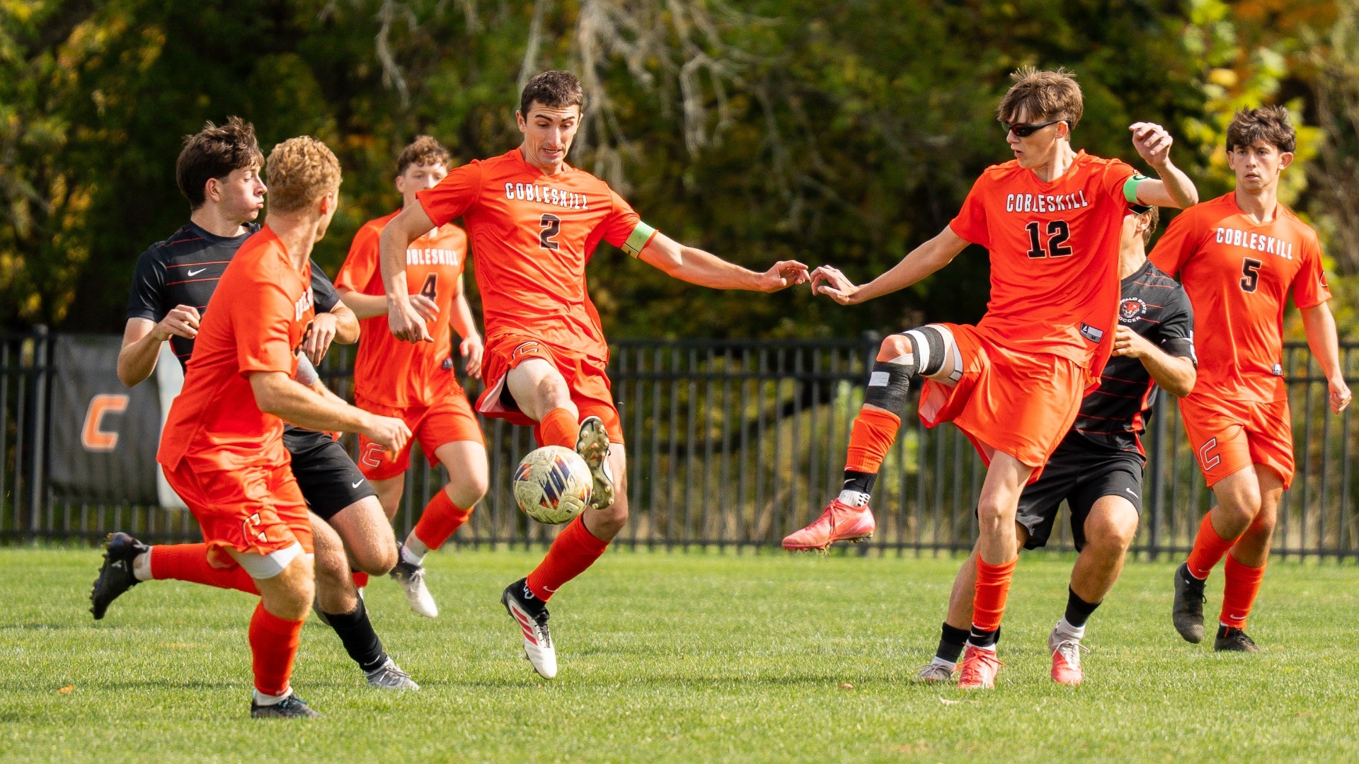 Cobleskill men's soccer defenders clearing the ball