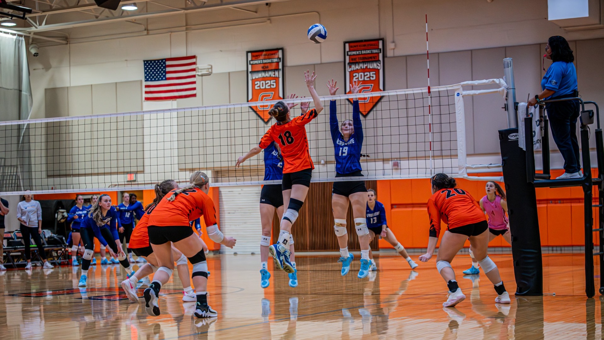Cobleskill women's volleyball Capasso attackin the net vs Alfred State