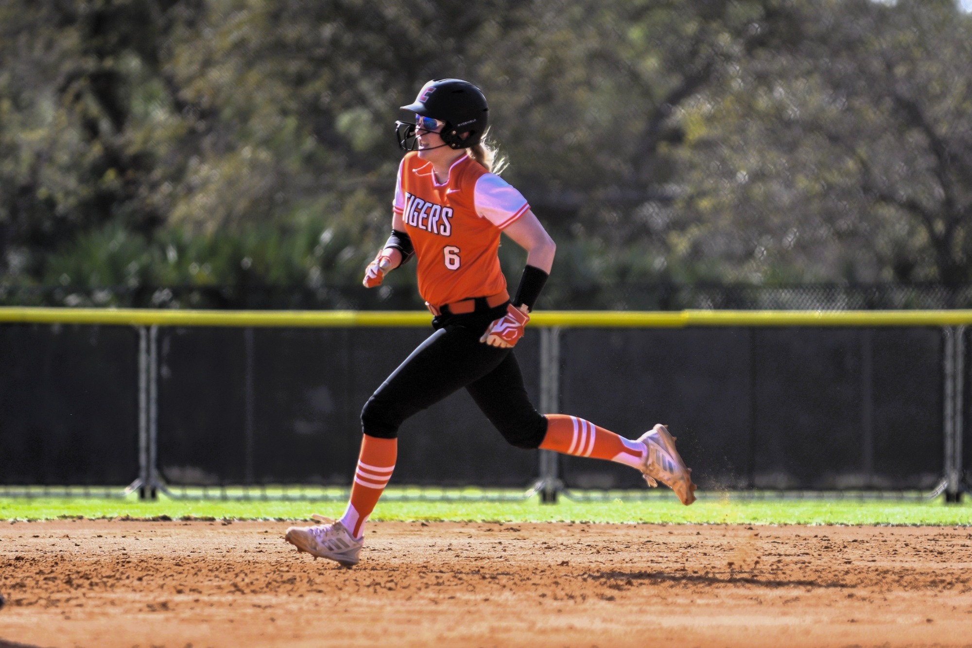 Mackenzie Carver rounding second base