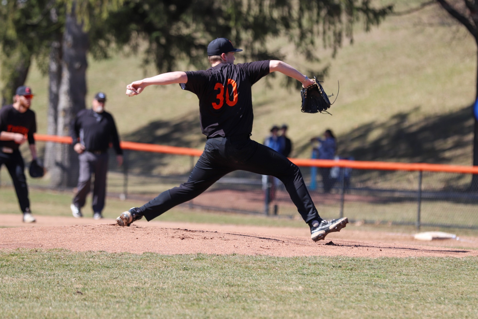 Reis Brammer on the mound, delivering a pitch