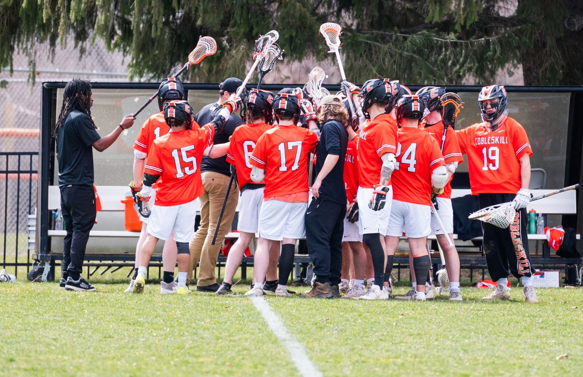 Men's Lacrosse team huddle