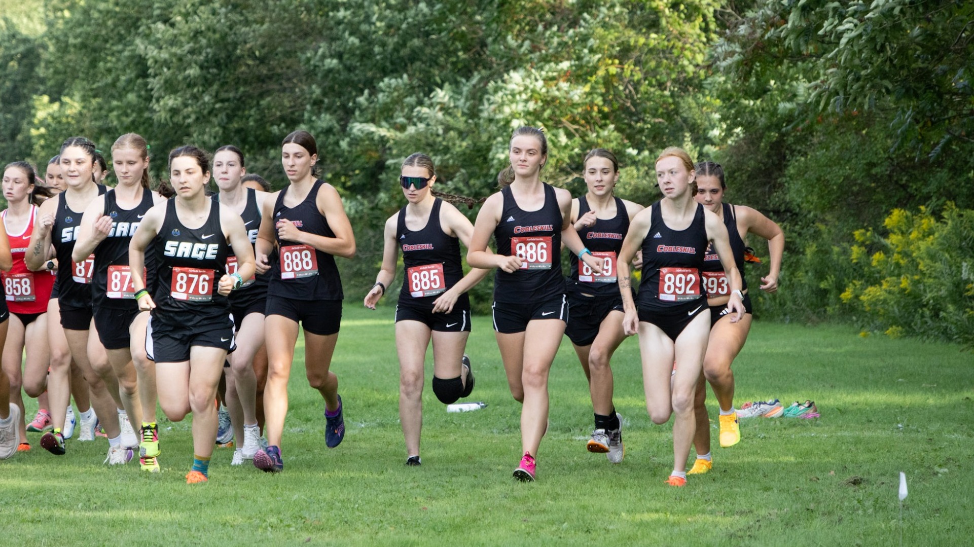 Women's Cross Country Team Taking off at the Start of a 4K
