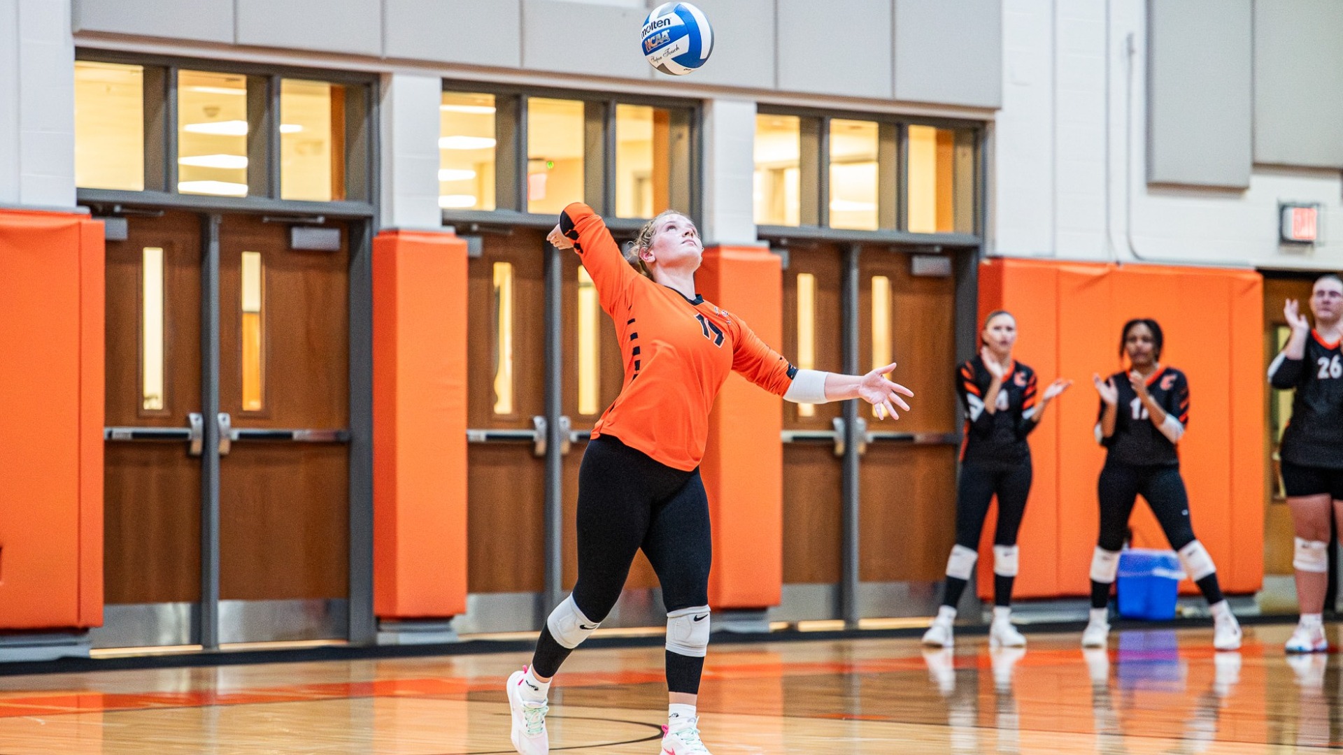 Cobleskill volleyball player Jojo Haycock serving the ball