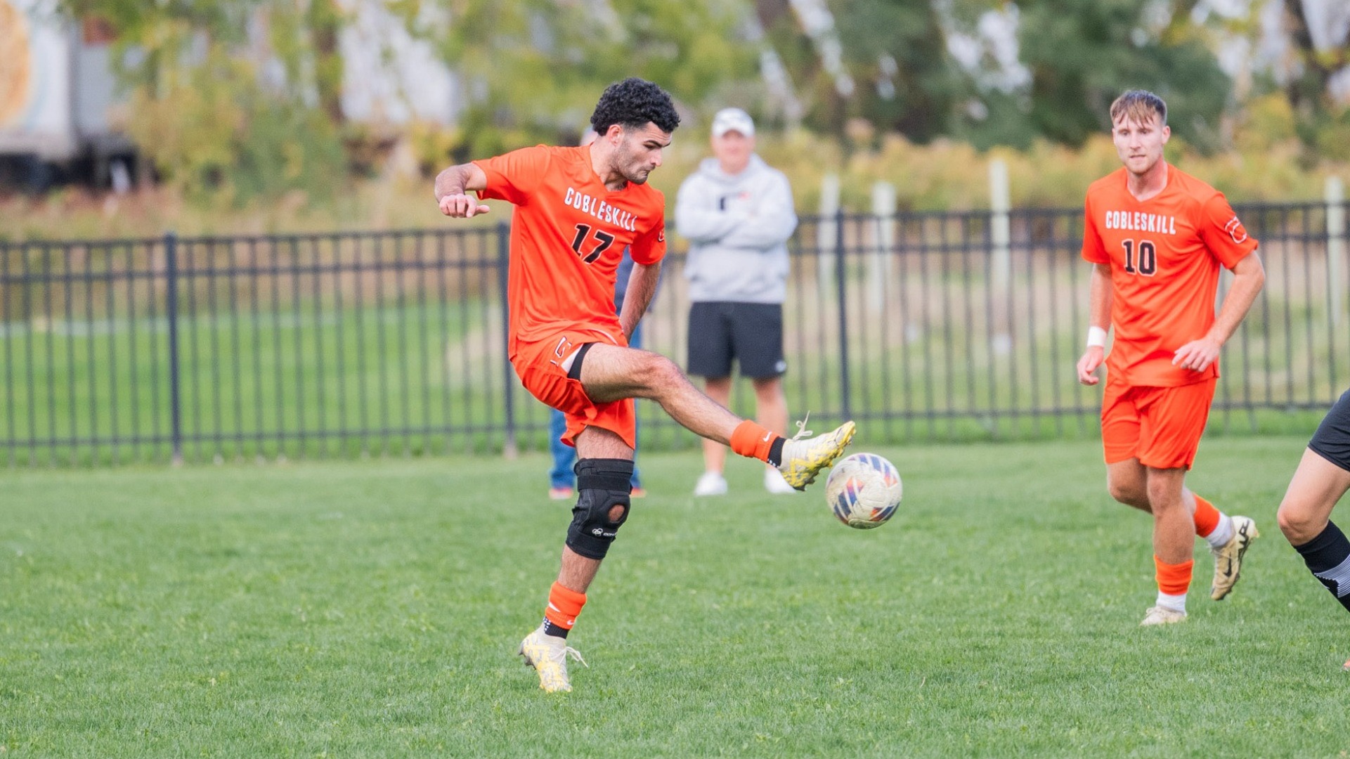 Cobleskill Men's Soccer Kensell #17 Battles for Ball Near Midfield 