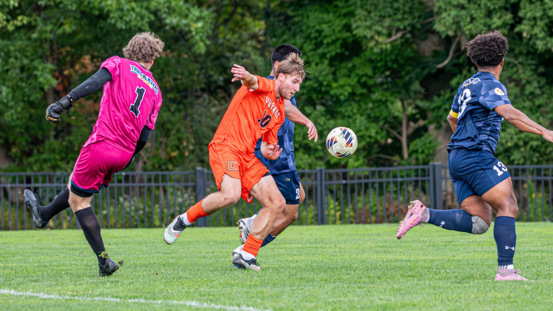 Cobleskill mens soccer Connor Fancher secures loose ball in box on his way to scoring