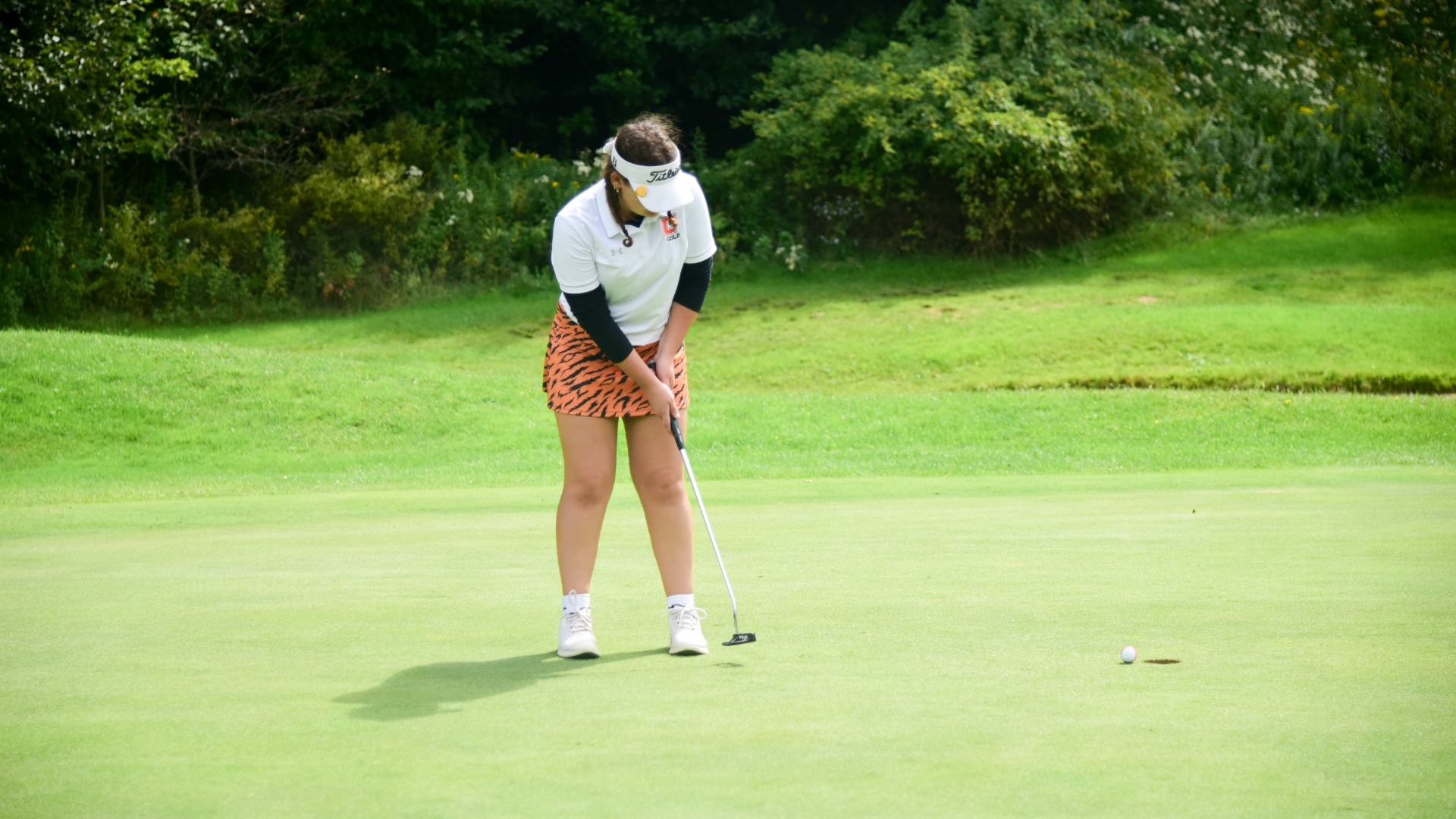 Cobleskill womens golfer Madison Paddock sinking a putt at Delhi