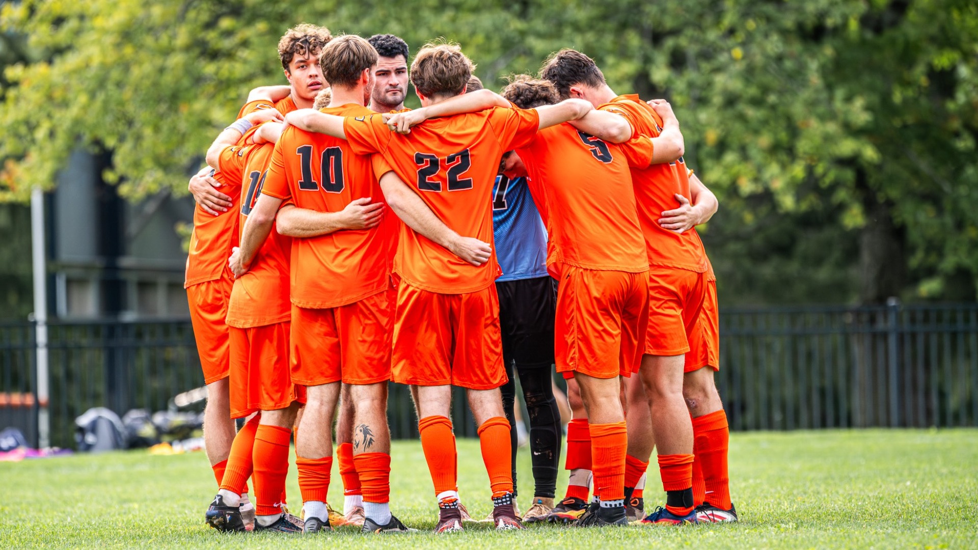 Cobleskill mens soccer team huddle with starters before their game vs MCLA