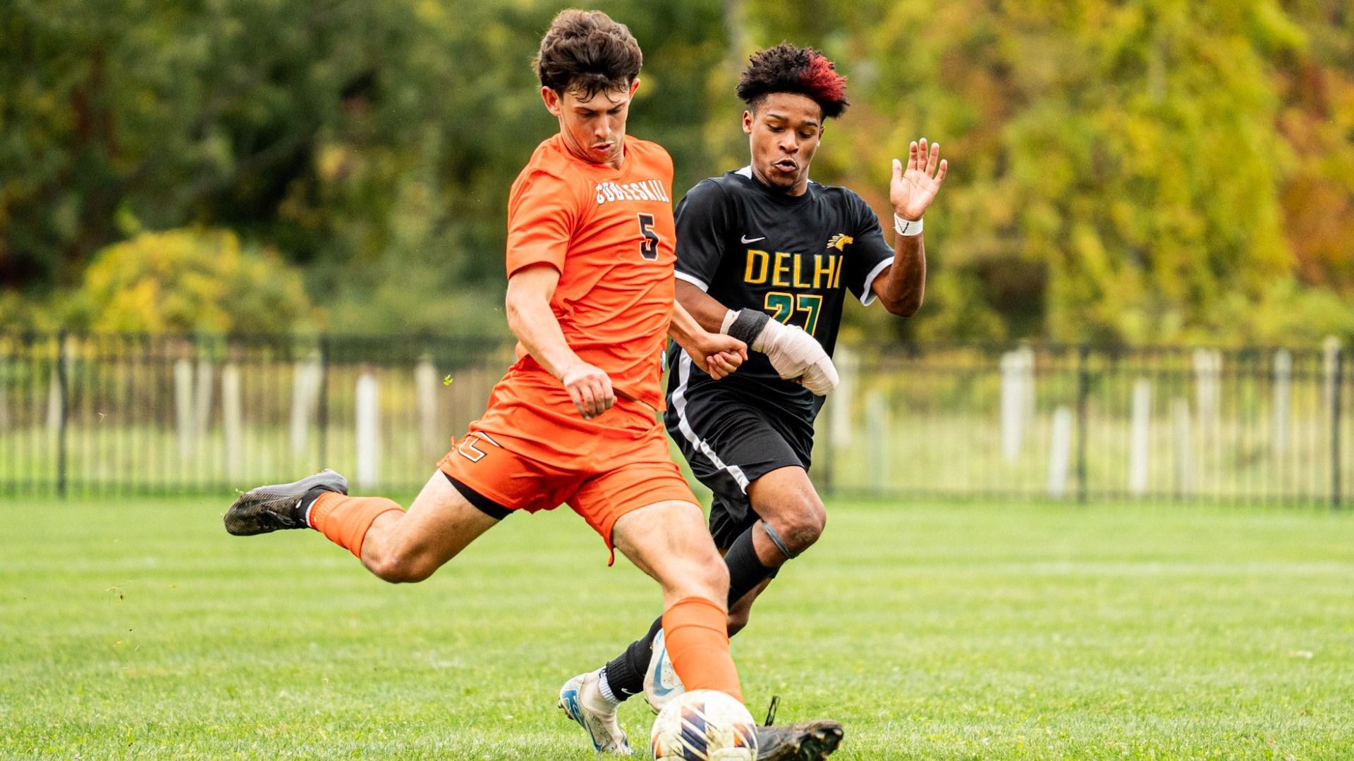 Cobleskill men's soccer player Austin Galley battling against Delhi player
