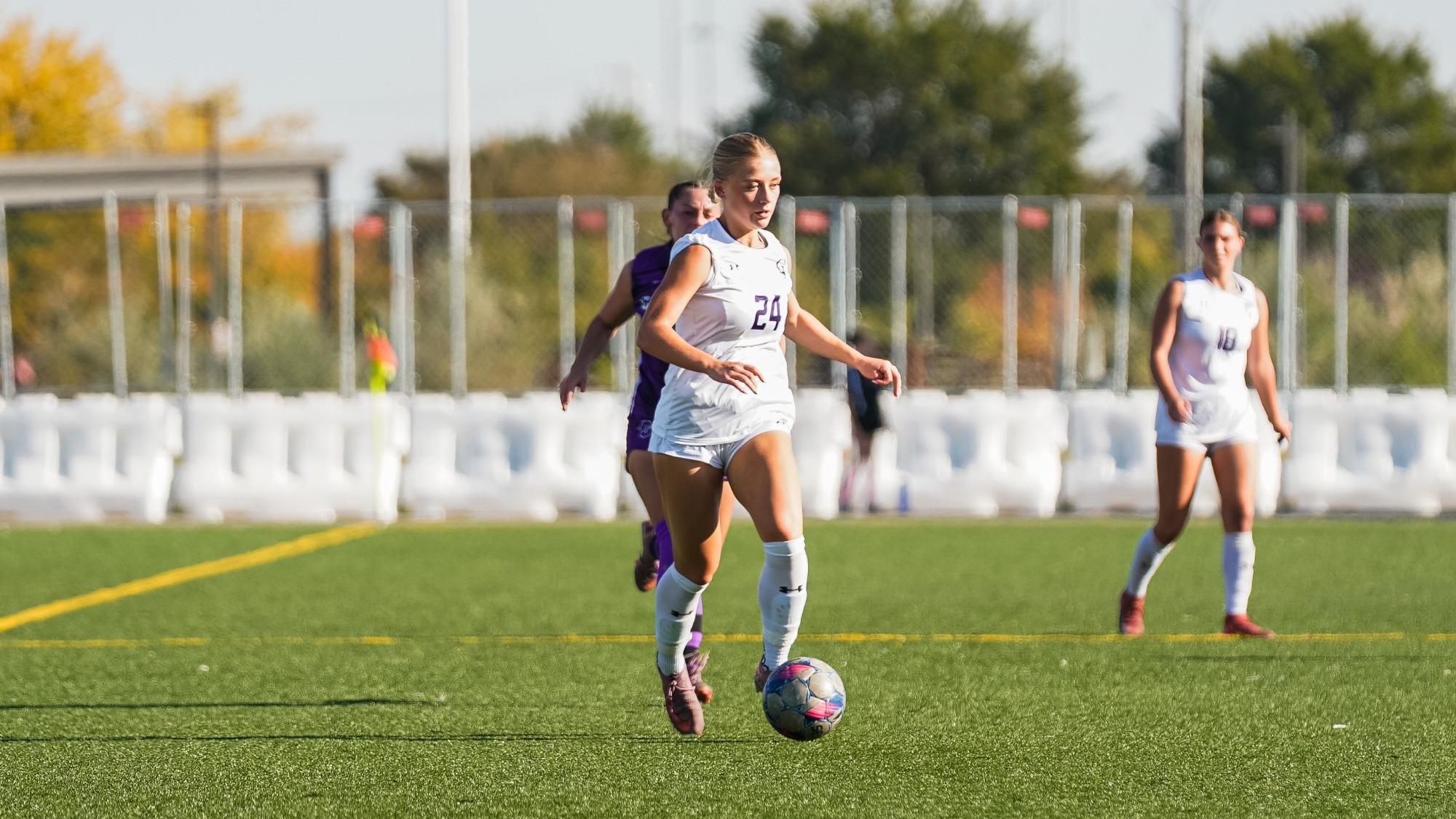 Claire Busse take the ball