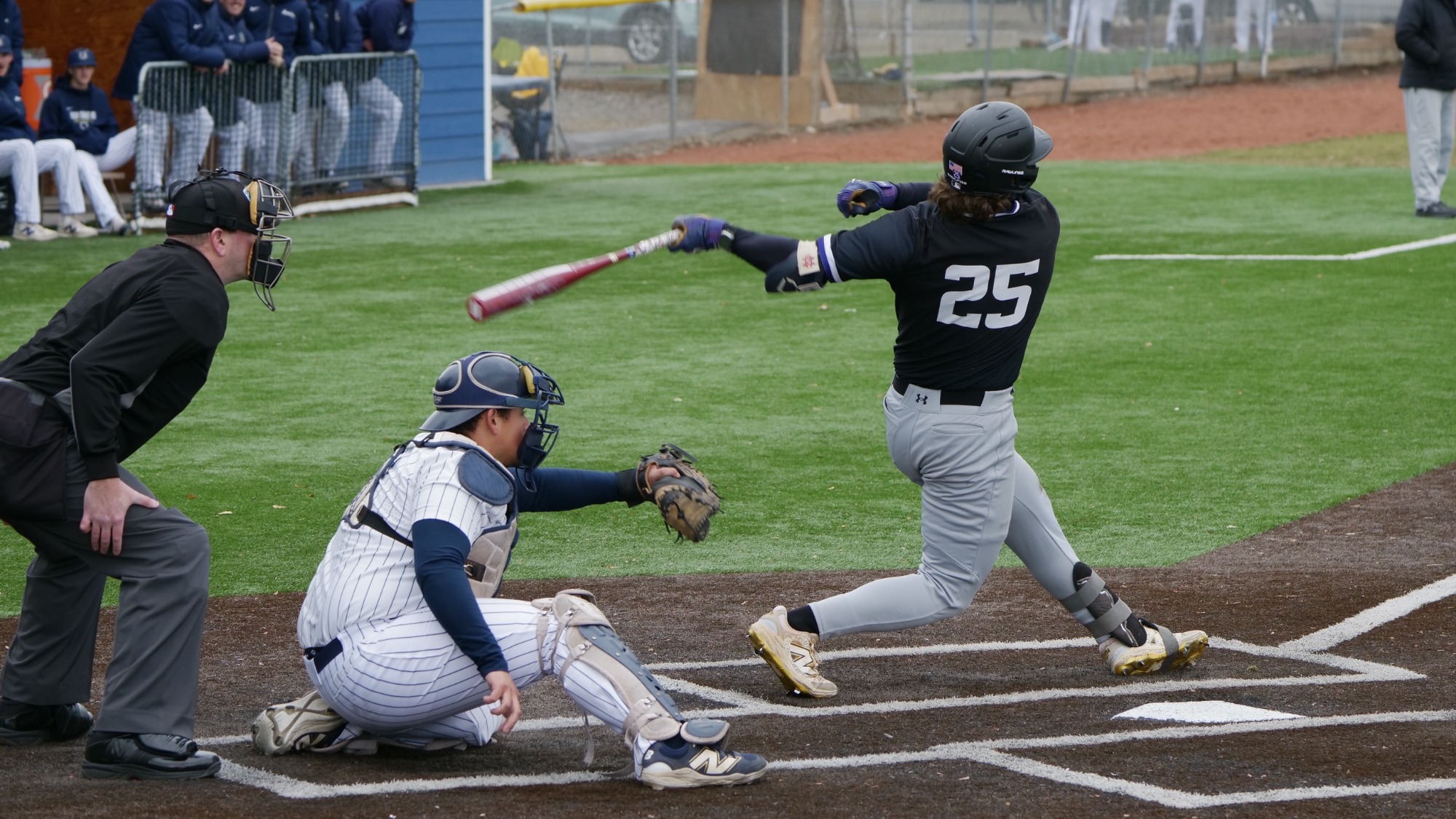 Yote swinging the bat