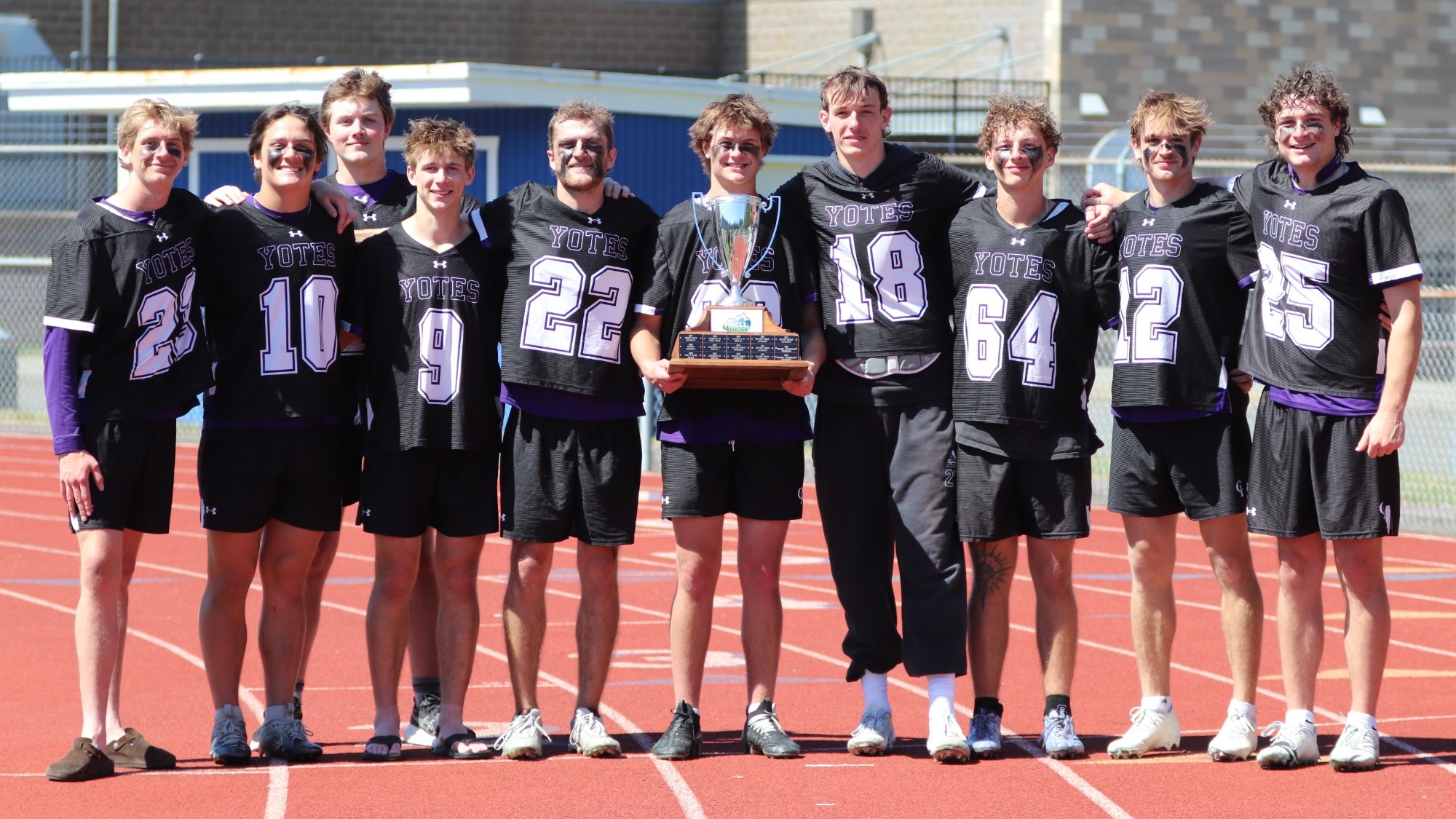 Yotes Holding PNCLL Championship Trophy