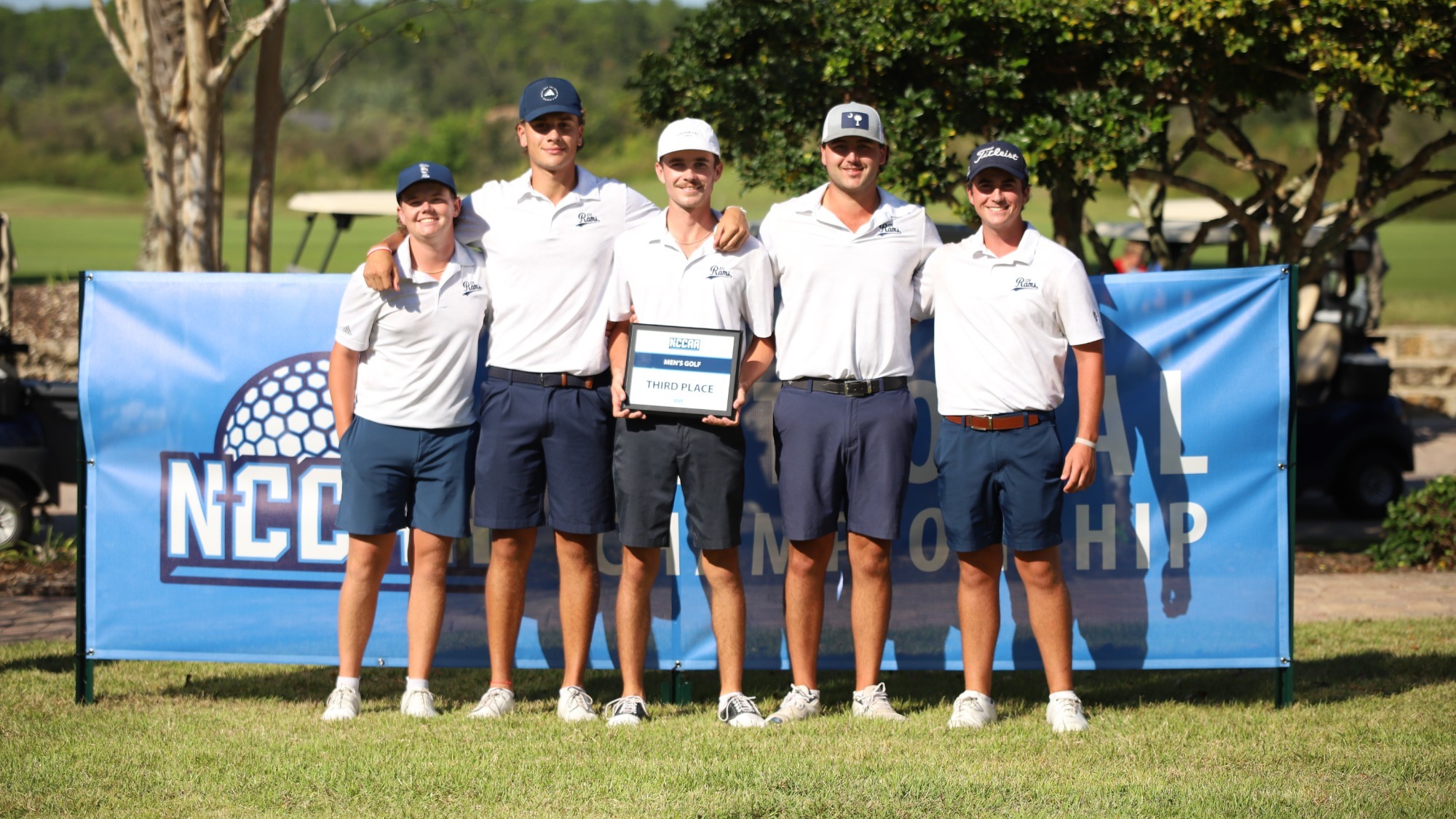 CIU men's golf receives their plaque at the NCCAA Championships 