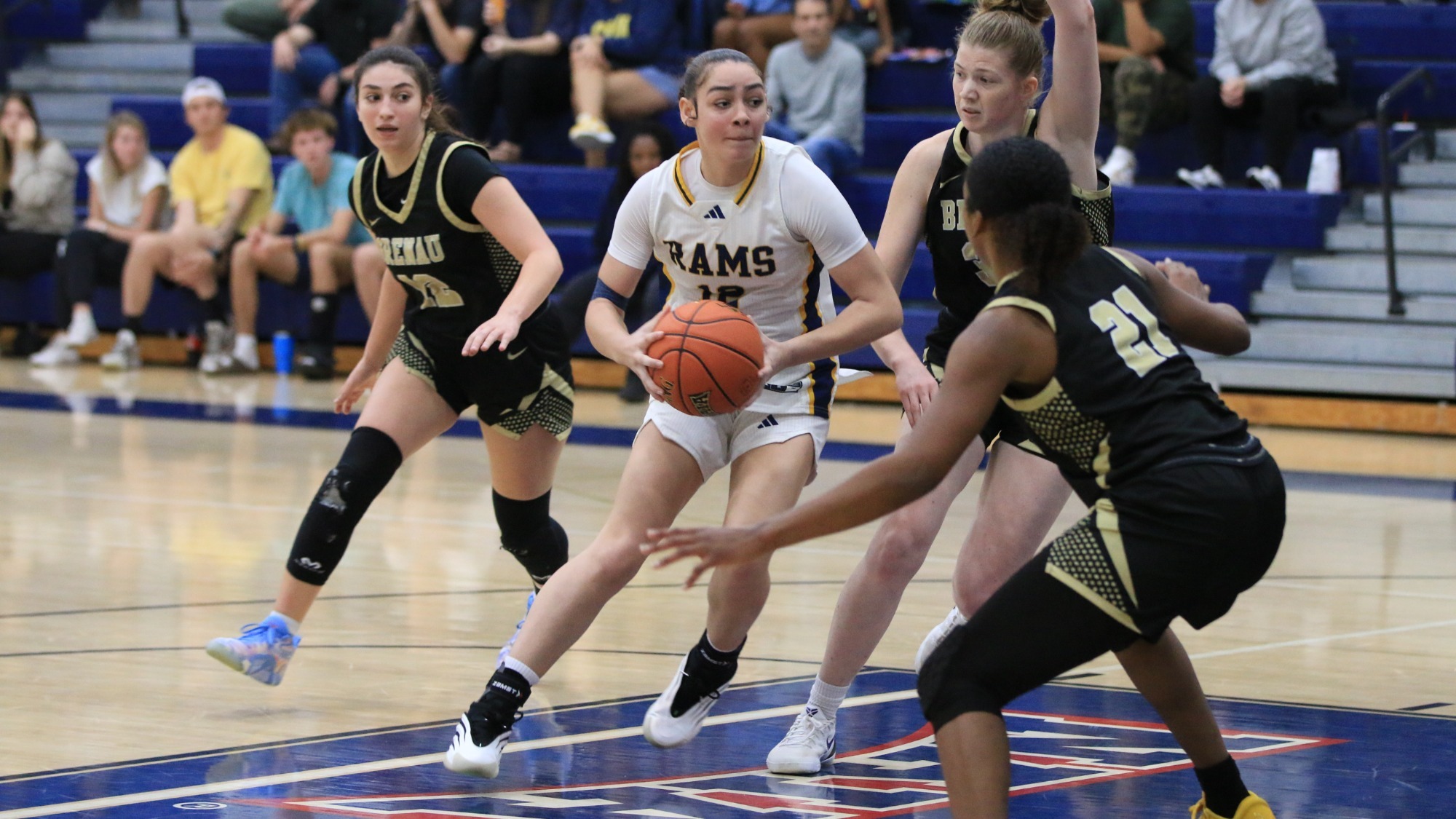 Bryanna Belton drives to the rim for CIU